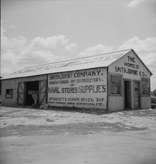 Large turpentine still and processing plant near Valdosta, Georgia, 1937. Creator: Dorothea Lange.