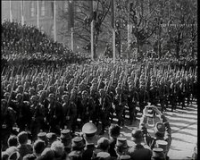 A Formation of Male German Soldiers Marching Past a Raked Platform of Officials on a Vienna..., 1938 Creator: British Pathe Ltd.