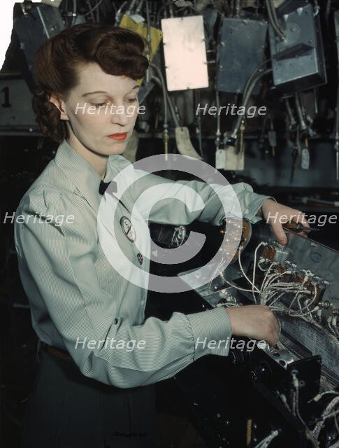 Electronics technician, Goodyear Aircraft Corp., Akron, Ohio, 1941. Creator: Alfred T Palmer.