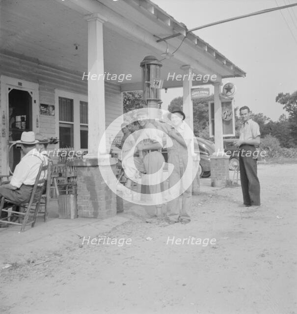 Rural filling station becomes community..., 4 July, near Chapel Hill, North Carolina, 1939 Creator: Dorothea Lange.