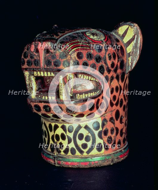 Kero or carved wood vase, jaguar head shaped, in polychromed wood.