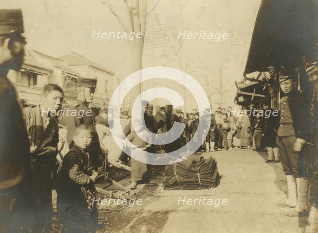 Distribution of blankets to troops at Tokio, c1904. Creator: Unknown.