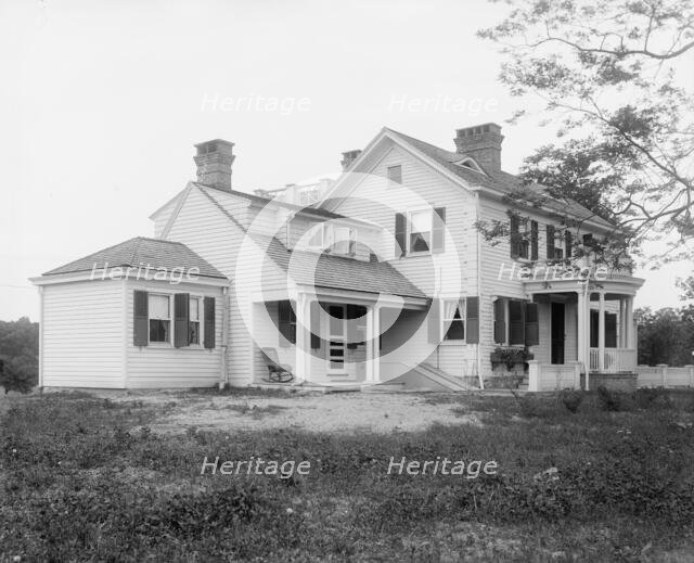 Calloway residence, back porch, with chair, Mamaroneck, N.Y., between 1900 and 1915. Creator: William H. Jackson.