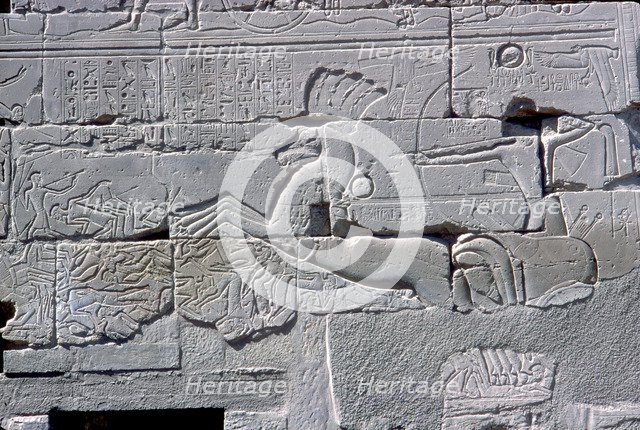 Detail of relief of Pharaoh in chariot riding down his enemies, Temple of Amun, Karnak, c1400 BC. Artist: Unknown
