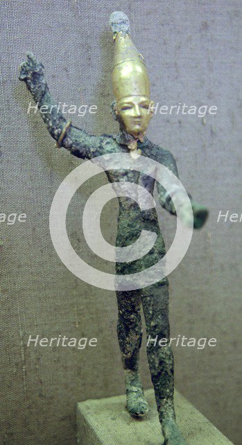 Gold and bronze statuette of Baal hurling a thunderbolt. Artist: Unknown