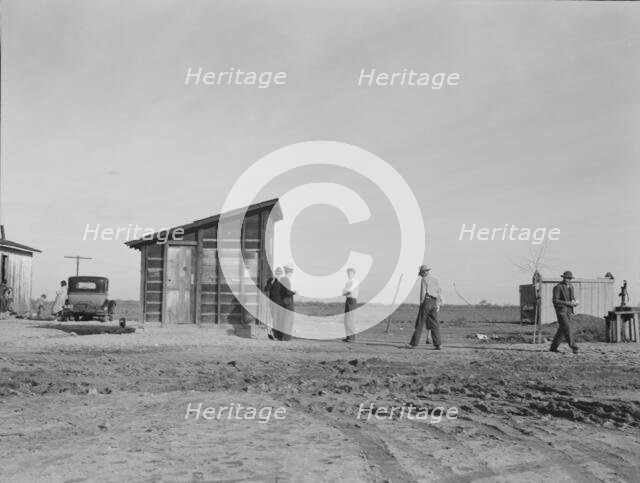 Cotton workers, outskirts of Firebaugh, west side of San Joaquin Valley, California, 1939. Creator: Dorothea Lange.