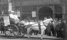 A 'press cart' outside the Woman's Press, Charing Cross Road, London, July 1911. Artist: Unknown