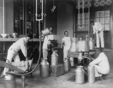 Five men making butter in a class at Hampton Institute, Hampton, Va., 1899 or 1900. Creator: Frances Benjamin Johnston.