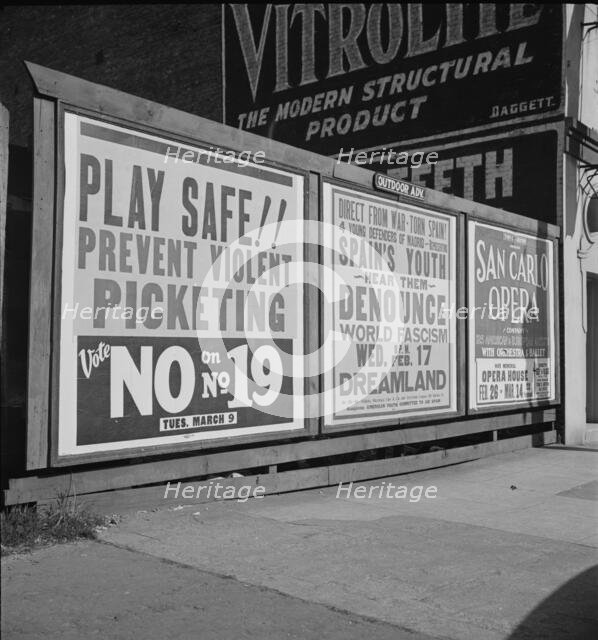 Signboards in San Francisco, California, 1937. Creator: Dorothea Lange.
