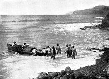 The Island of Montserrat (West Indies) - coast of Montserrat - boat taking lime juice to ship, 1895. Creator: Unknown.