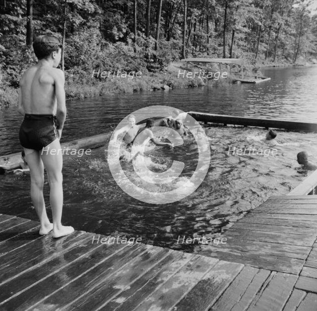 Shallow swimming pool for learners at Camp Nathan Hale, Southfields, New York, 1943 Creator: Gordon Parks.