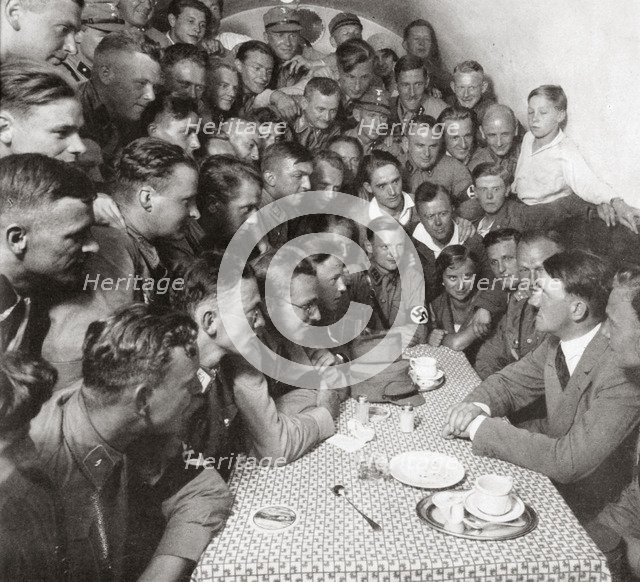 'The supreme SA leader Adolf Hitler with his comrades', 1938. Artist: Unknown