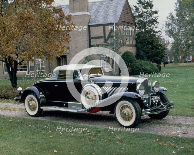 A 1931 Duesenberg J. Artist: Unknown