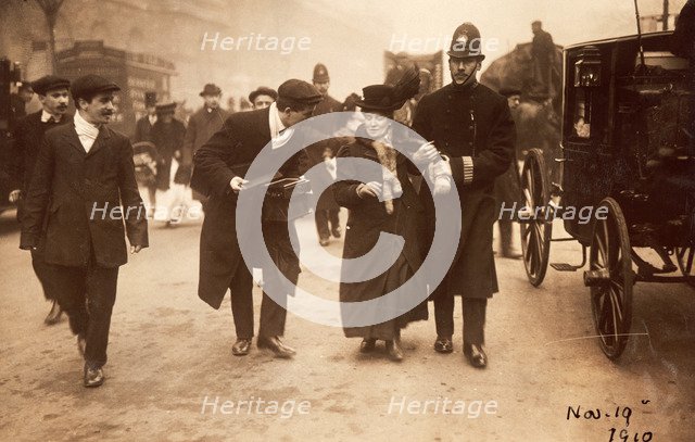 Suffragette being arrested, 19th November 1910. Artist: Unknown