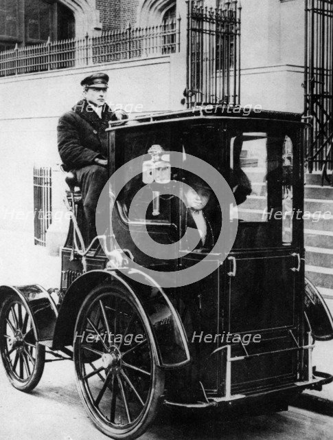 Woman passenger in a 1910 taxi cab, New York, USA, (c1910?). Artist: Unknown