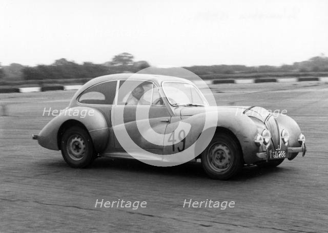 1947 Healey Elliott 2.4, E.B Wadworth at Silverstone 1956. Creator: Unknown.