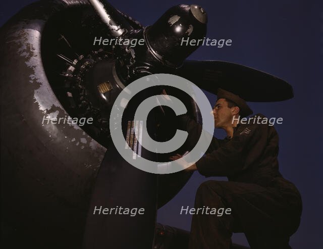 Servicing [an] A-20 bomber, Langley Field, Va., 1942. Creator: Alfred T Palmer.