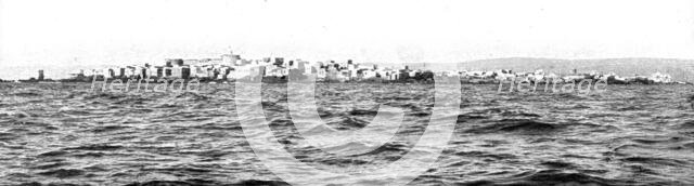 'Le drapeau Francais sur la cote Syrienne; L'ile Rouad, a 2 kilomtres de la cote..., 1915 (1924). Creator: Unknown.