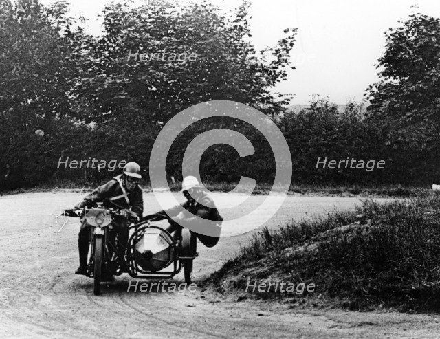 G Tucker racing a Norton bike, 1924. Artist: Unknown