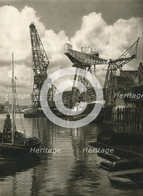 'Kiel - Giant floating crane of the Germania Shipbuilding Yards', 1931. Artist: Kurt Hielscher.