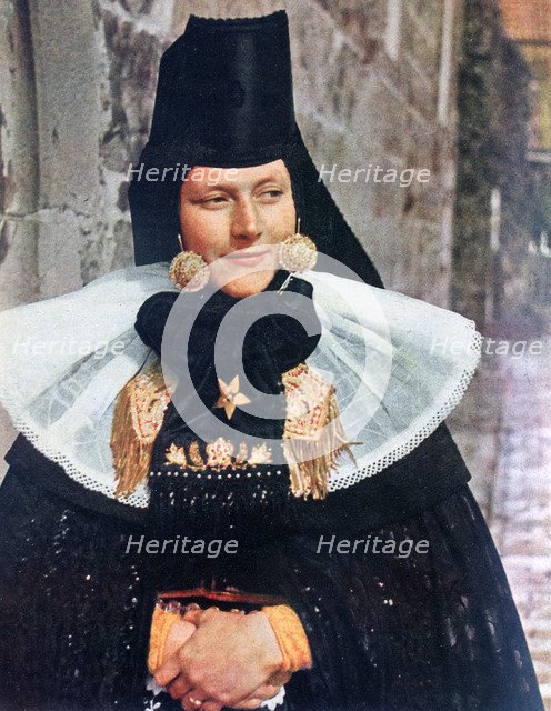 Young woman of Lindhorst in local costume for a fete, Germany, 1942. Artist: Unknown