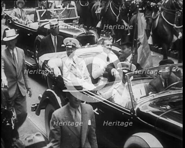 Italo Balbo Sitting in a Car With Others, 1933. Creator: British Pathe Ltd.