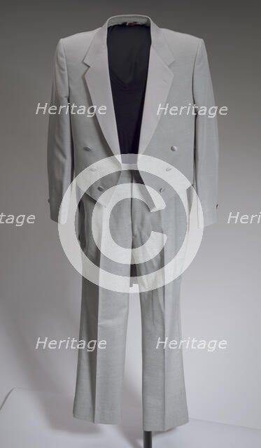 Grey tail coat worn by Cab Calloway, 1976-1995. Creator: After Six.