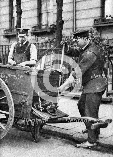 A gas fitter, London, 1926-1927.Artist: McLeish