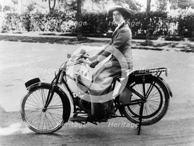 A woman on a Douglas motorbike, (c1913?). Artist: Unknown