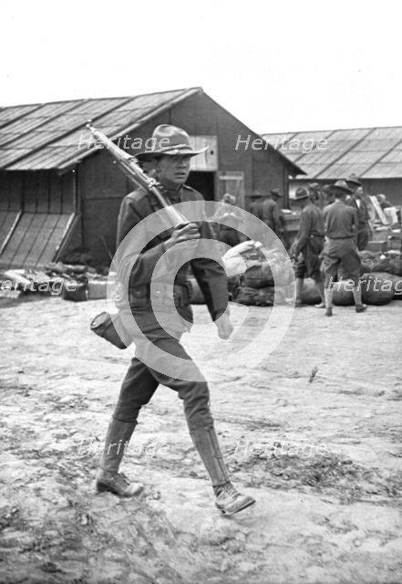 'Les <<Boys>> de L'Amerique; Au Camp Americain de Saint-Nazaire: une sentinelle', 1917. Creator: Jean Clair-Guyot.