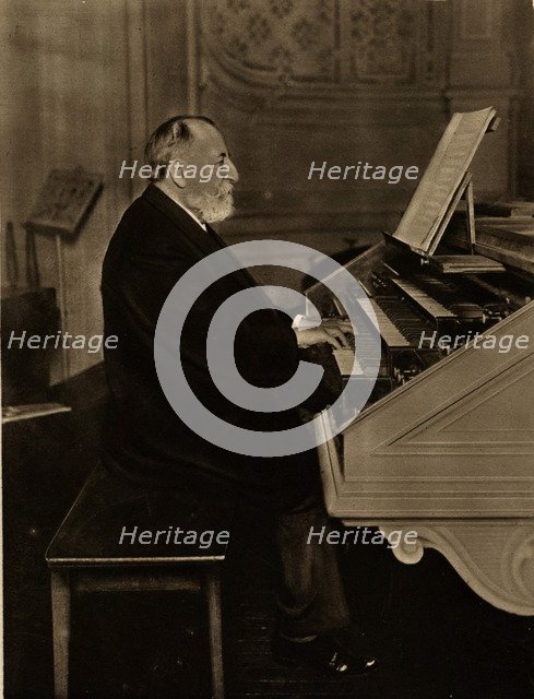 Camille Saint-Saëns (1835-1921) at the Organ, 1913. Creator: Anonymous.