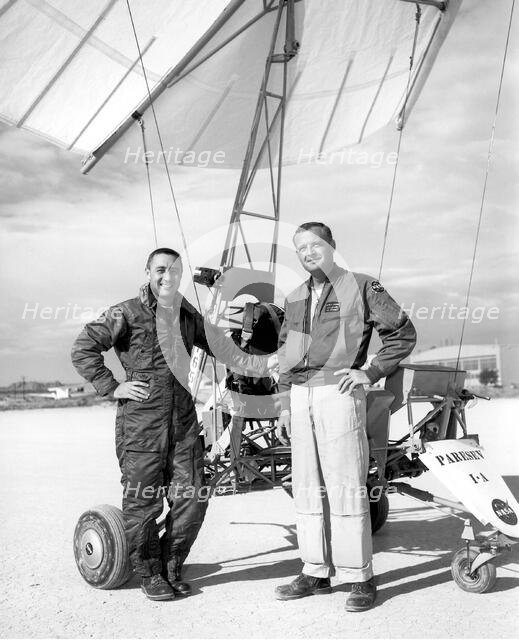 Gus Grissom and Milt Thompson with Paresev, California, USA, 1962.  Creator: NASA.
