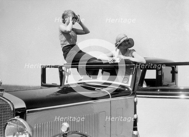 Kitty Brunell road testing a 1931 Delage D8. Artist: Bill Brunell.