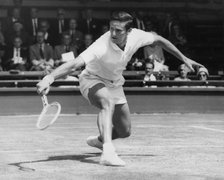 Roy Emerson, Australian tennis player, in action at Wimbledon, 1964. Artist: Unknown