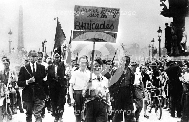 Members of the Resistance marching on the Place de la Concorde, liberation of Paris, August 1944. Artist: Unknown