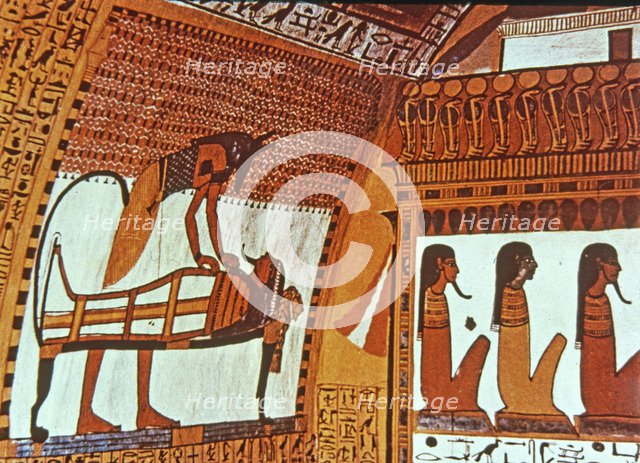 God Anubis mummifying a deceased, fresco in the tomb of Sennutem.