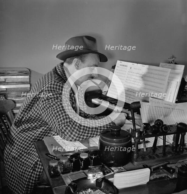 Portrait of Brick Fleagle in his home, New York, N.Y., 1946. Creator: William Paul Gottlieb.