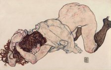 Kneeling Girl, Resting on Both Elbows, 1917. Artist: Schiele, Egon (1890–1918)