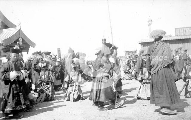 A group of Buddhist monks in the datsan, 1880.  Creator: Nikolai Nikolaevich Petrov.
