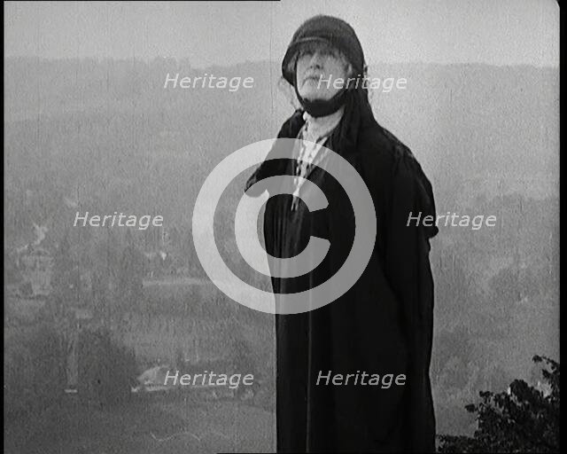 Dame Ellen Terry Standing on a Hill Looking at the View, 1920s. Creator: British Pathe Ltd.