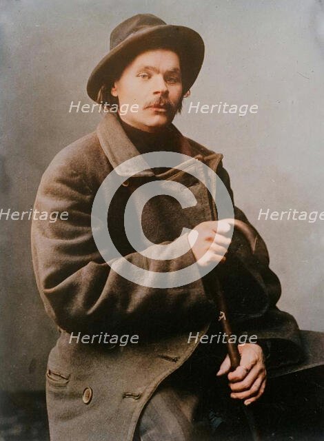 Maxim Gorky, seated with heavy coat on, 1910. Creator: Bain News Service.