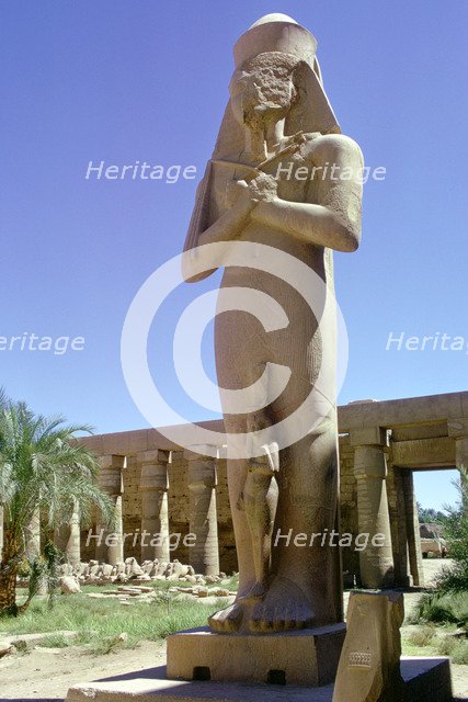 Colossal statue, Karnak, Egypt. Creator: Tony Evans.