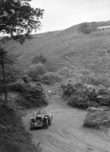 1935 MG PA taking part in a motoring trial in Devon, late 1930s. Artist: Bill Brunell.