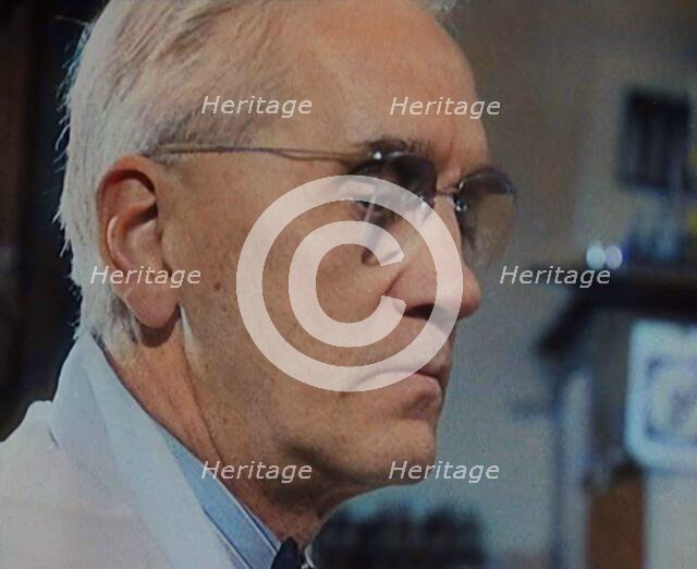 Dr Alexander Fleming, the Inventor of Penicillin, Experimenting in a Laboratory, 1929. Creator: British Pathe Ltd.