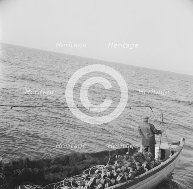 Possibly: On board the fishing boat Alden, out of Glocester, Massachusetts, 1943. Creator: Gordon Parks.