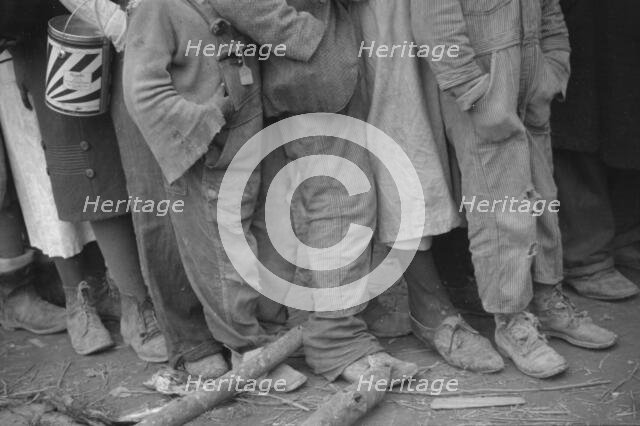 Negroes in the lineup for food at mealtime in the camp for flood..., Forrest City, Arkansas, 1937. Creator: Walker Evans.