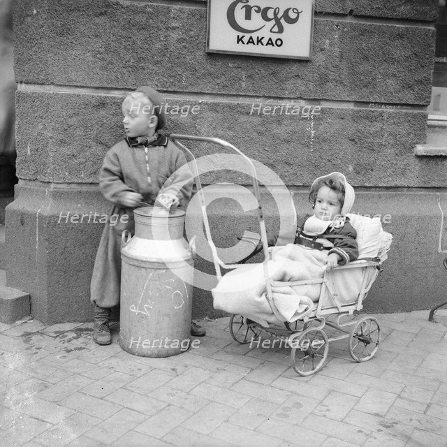 Two children in the street, Sweden. Artist: Unknown