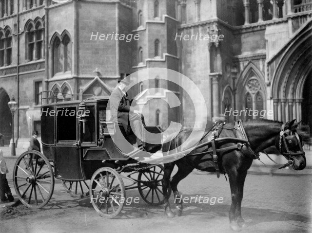 Carriage outside the Royal Courts of Justice, Strand, London, after 1882. Artist: Unknown