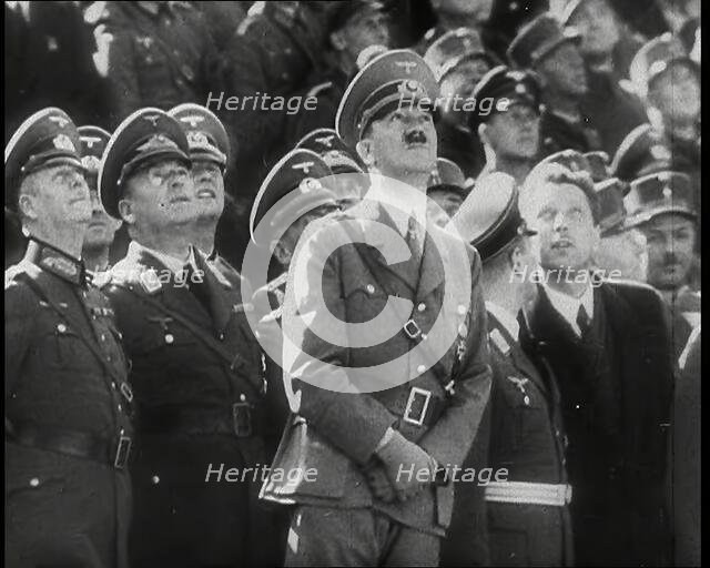 Adolf Hitler, the German Leader Looking Upwards and Watching a Fly Past of Aeroplanes..., 1939. Creator: British Pathe Ltd.