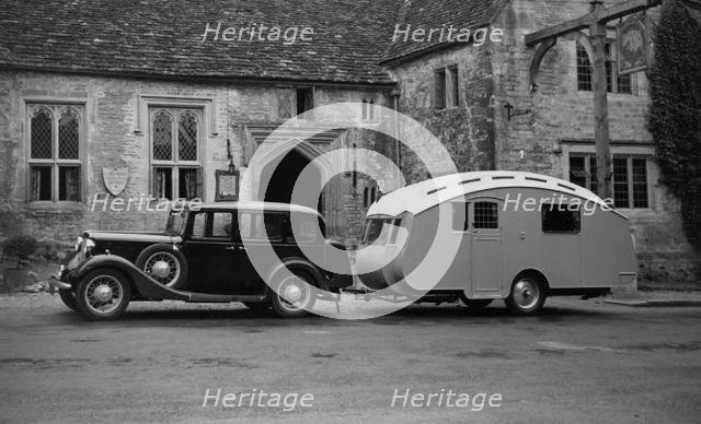 1935 Austin Light 13.9 Ascot saloon with Winchestr Royal caravan. Creator: Unknown.
